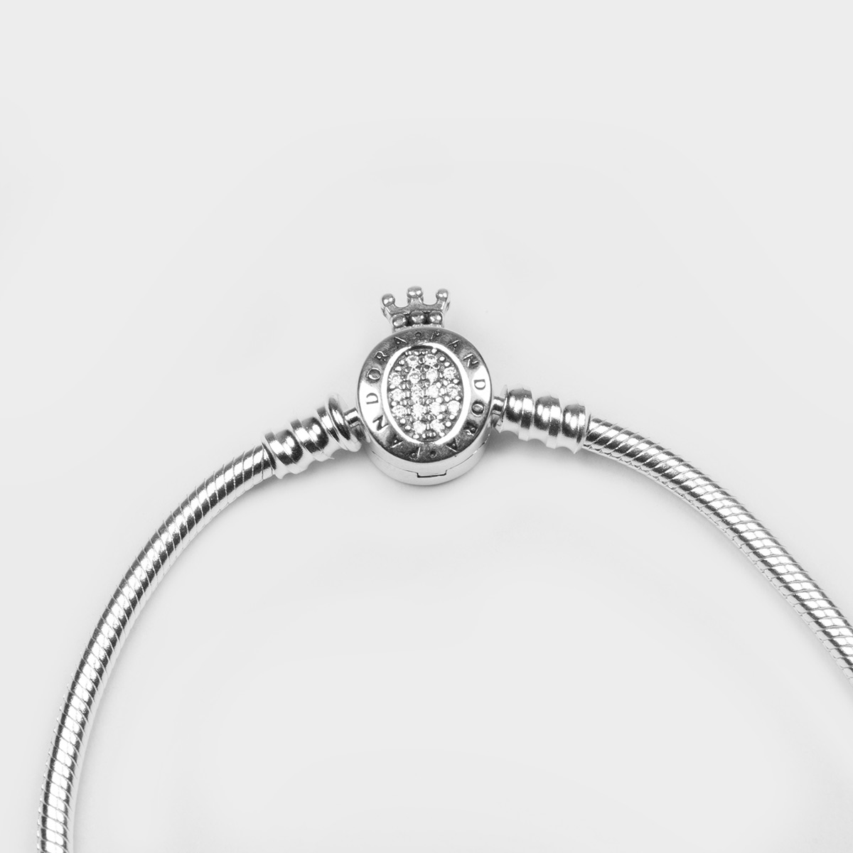 Pulsera Charm de Trama con Cierre O Coronado - Plata 925